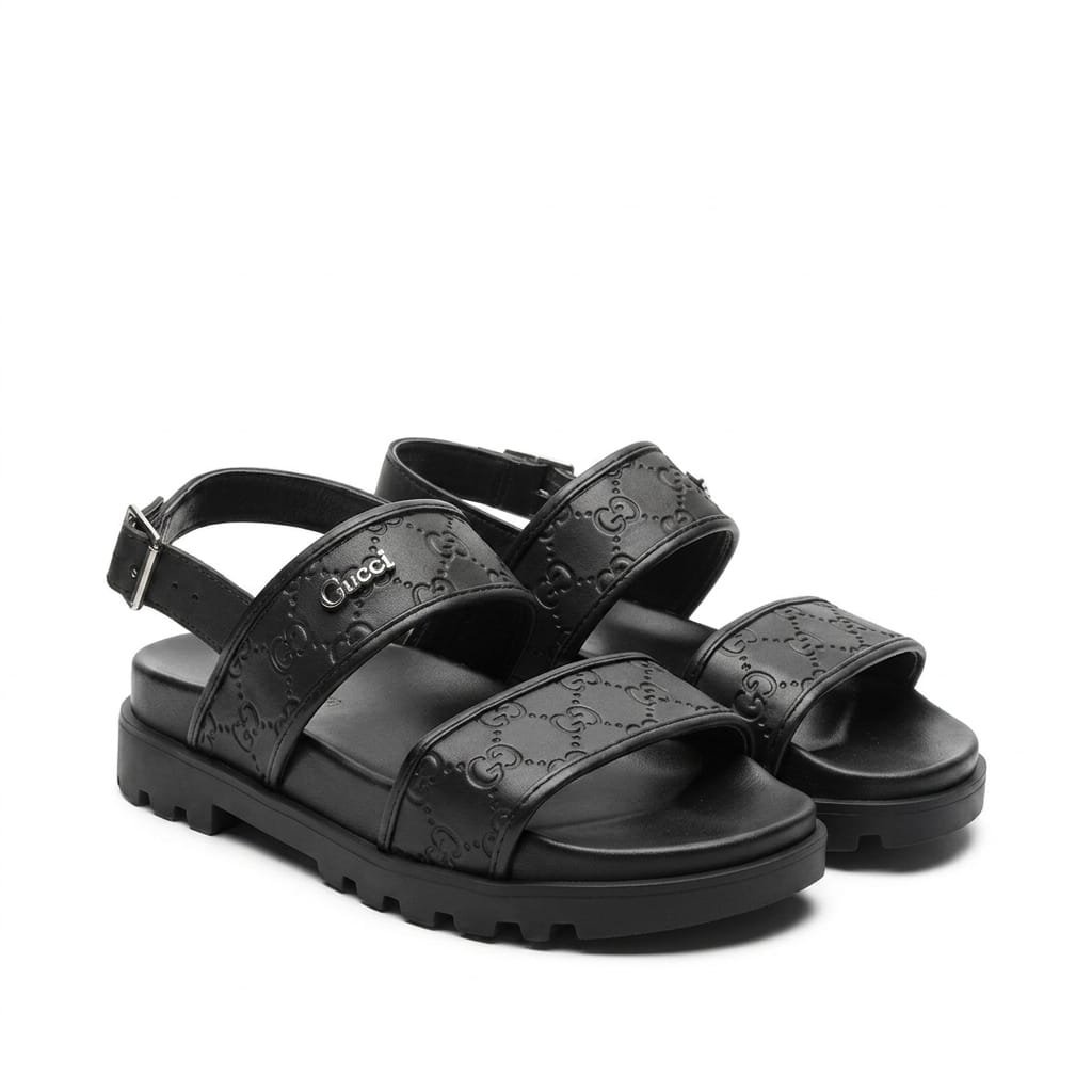 GUCCI GG EMBOSSED LEATHER PLATFORM SANDALS