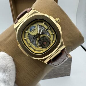 Gold-Tone Nautilus-Style Skeleton Watch with Brown Leather Strap