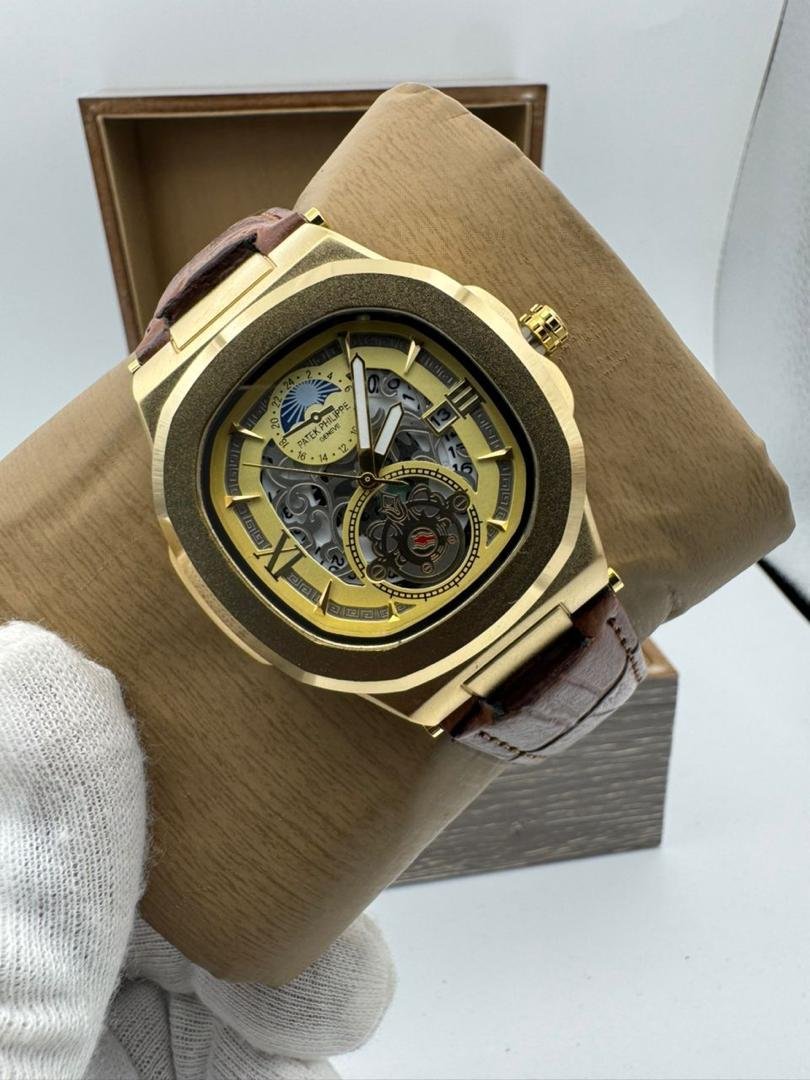 Gold-Tone Nautilus-Style Skeleton Watch with Brown Leather Strap